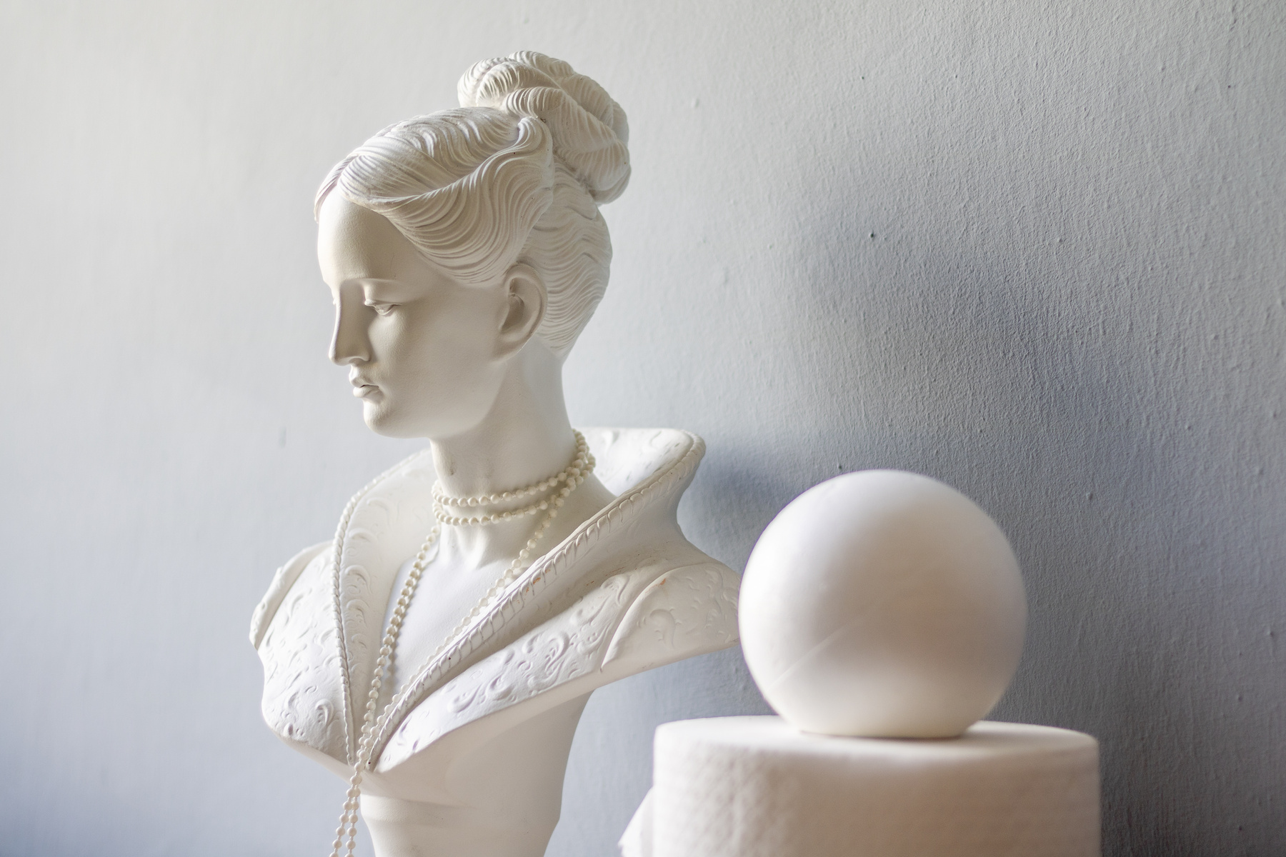 Bust of a Woman Wearing Pearls